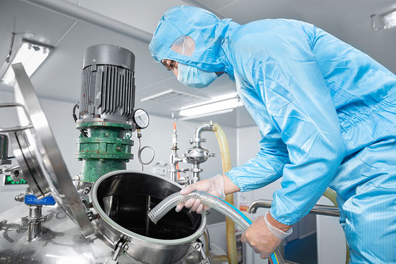 Our worker is operating the emulsifying machine